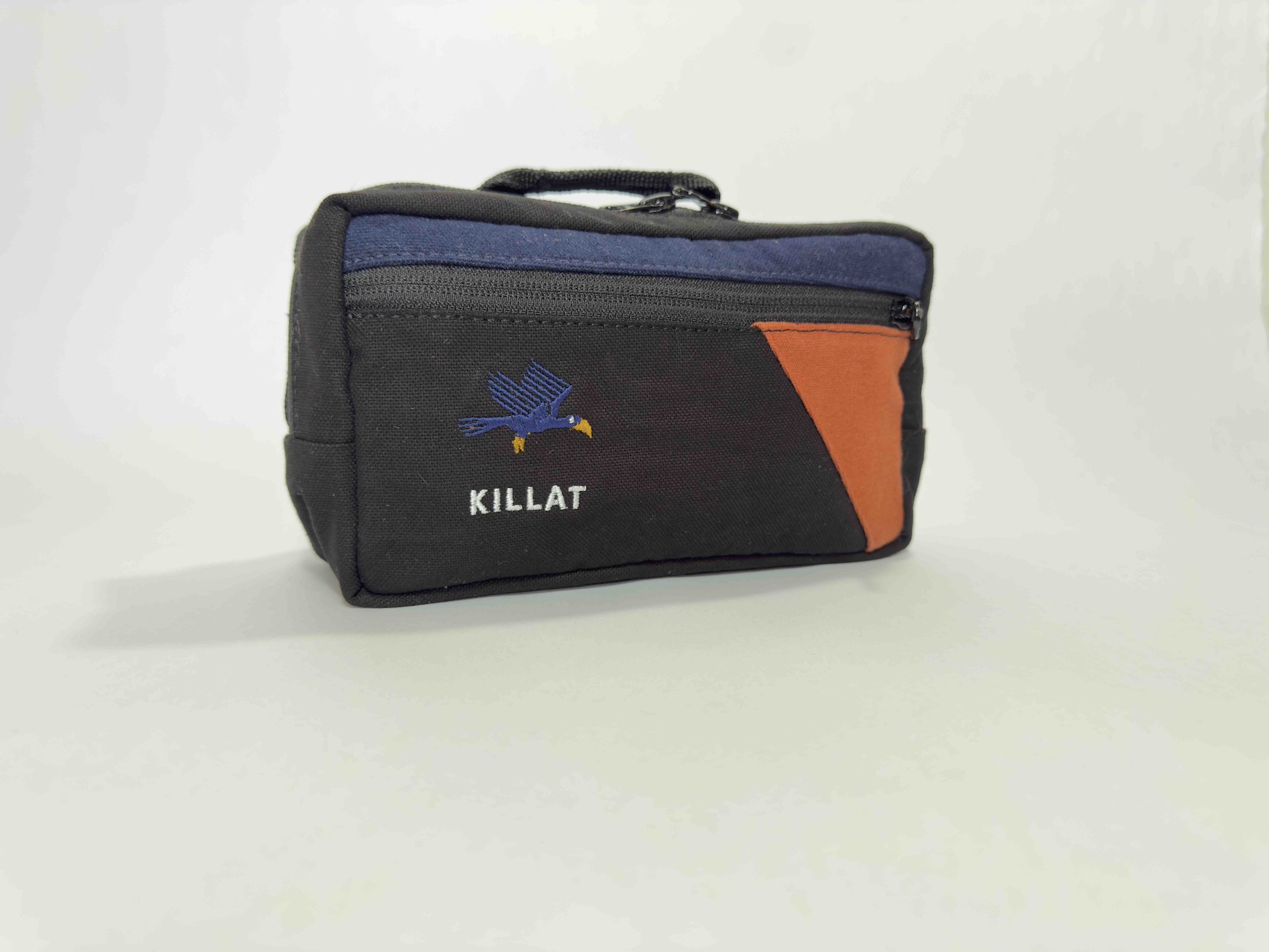 Killat Kota Moon handlebar hip bag with black, blue and orange on a white background