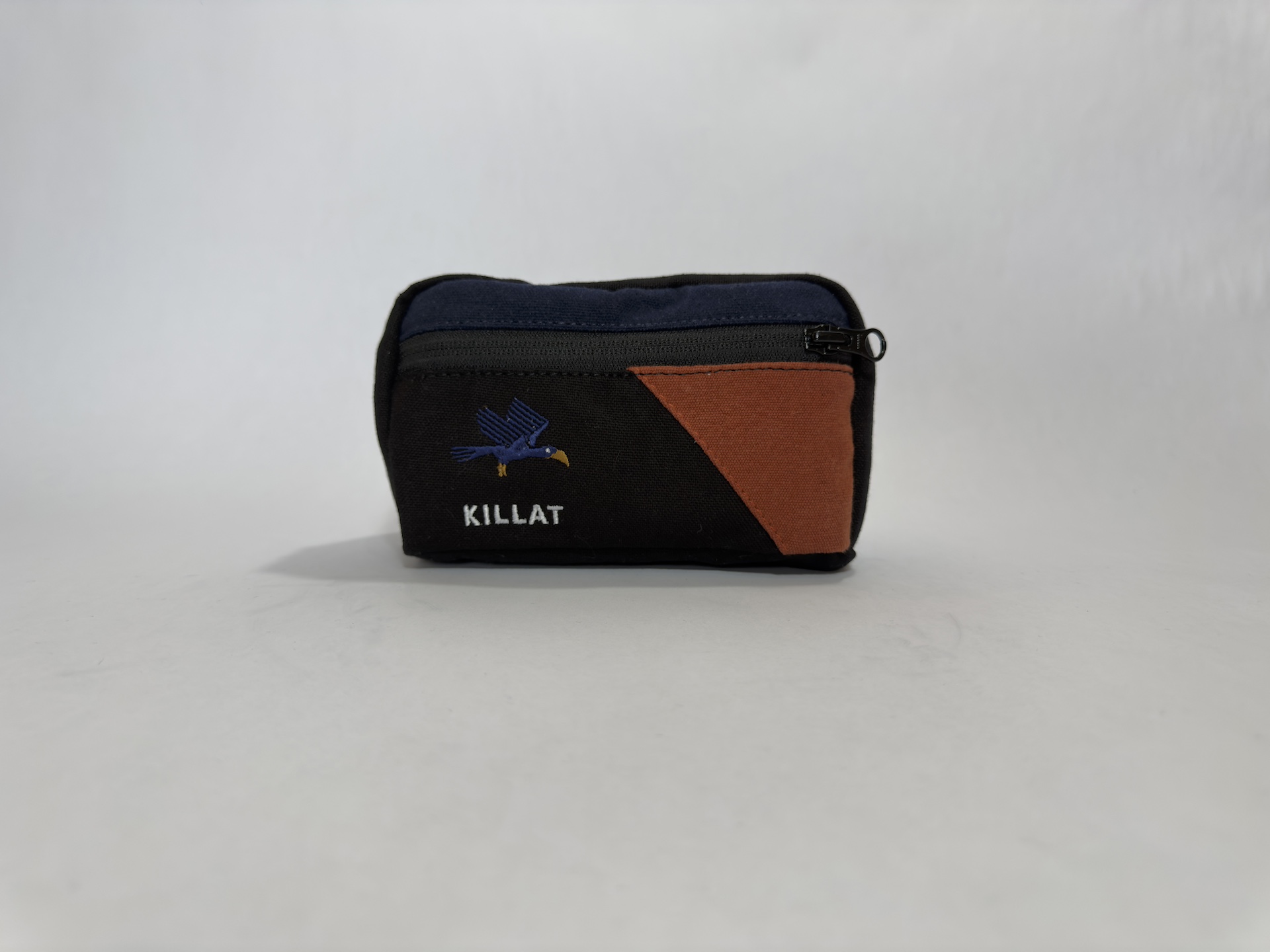 RW_NewMoon Killat Collective New Moon hipbag in black, blue and orange on a white background